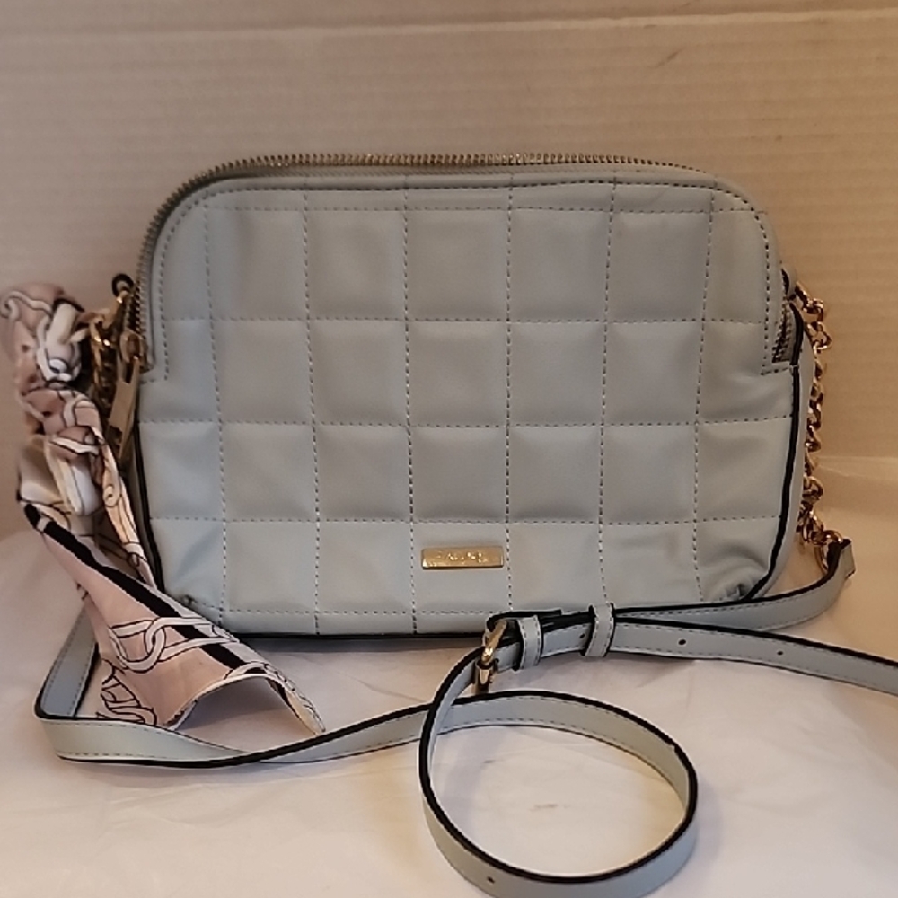 Aldo Quilted Light Blue Crossbody Bag with Scarf Accent.
